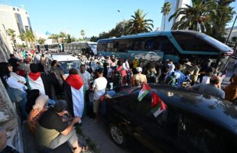 Activists from Tunisia organize a bus caravan traveling overland to Gaza Activists from Tunisia organize a bus caravan
