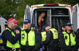 UK police arrest 6 after protesters descend on a hotel housing asylum seekers A town on the outskirts of London was rocked by protesters who descended on a hotel housing asylum seekers for the second time in four days on Sunday night, amid anger about a migrant accused of sexual assault. Police in the town of Epping said they arrested six people on Sunday, including four suspected of involvement in “violent disorder” during the previous demonstration on Thursday. Officers patrolled the area around the Bell Hotel throughout the night after issuing an order for the crowds to disperse. Chanting “Save our kids” and “Send them home,” more than 100 demonstrators, some brandishing British flags, gathered outside the hotel Sunday evening. The protests escalated as night fell, with flares and projectiles thrown toward police vans blocking the entrance. Police escorted a counter-protester from the area after demonstrators surrounded her. “Disappointingly we have seen yet another protest, which begun peacefully, escalate into mindless thuggery with individuals again hurting one of our officers and damaging a police vehicle,” Chief Superintendent Simon Anslow of the Essex Police said in a statement. “For anyone who thinks we will tolerate their thuggery – think again.” The protests come amid escalating tensions over the rising number of asylum seekers who are being housed at government expense in hotels around the country. Those pressures flared into days of rioting last month in Northern Ireland after two teenagers were arrested on charges of sexual assault. Violent anti-immigrant protests spread throughout the UK last summer after social media users spread misinformation about the identity of the person who attacked a dance class in the northwestern town of Southport, killing three young girls. The attacker was a 17-year-old who was born in the UK born in the UK to parents from Rwanda, not an asylum seeker as had been rumored. Prime Minister Keir Starmer condemned last year’s riots as “far-right thuggery” as police intervened to stop the violence and expedited the sentencing of those convicted of taking part. Before Sunday’s protests in Epping, local police issued an order that allowed them to force demonstrators to remove face coverings. The later issued an order for the demonstrators to leave the area around the hotel. That dispersal order remained in effect until 4 a.m. Monday. The demonstration came after eight police officers were injured on Thursday after a peaceful protest outside the hotel escalated into violence. Police blamed the violence on people from outside the community who “arrived at the scene intent on causing trouble.” Four of those detained on Sunday were arrested in connection with events that happened during the initial protest, police said. A fifth was arrested on suspicion of causing criminal damage to a police car, while the sixth was arrested for being equipped to cause criminal damage. The protests began after a 38-year-old asylum seeker was charged with sexual assault after allegedly attempting to kiss a 14-year-old girl. The man is being held without bail after he had his first court appearance on July 10. He denies the charges. “We don’t take sides, we arrest criminals and we have a duty to ensure no-one is hurt — plain and simple,″ Anslow said. “I know the people of Essex know what we’re about so I know they won’t believe the rubbish circulating online that is designed to do nothing more than inflame tensions and trouble.’’ Epping Forest District Council, which provides local government services in the area, condemned the violence but said it had long opposed the central government’s decision to use the Bell Hotel to house asylum seekers. “We have consistently shared concerns with the Home Office that the Bell Hotel is an entirely unsuitable location for this facility and should close,” council Leader Chris Whitbread said in a statement last week. “We continue to press Home Office officials for the immediate closure of the site and are encouraged that our local MPs are now actively supporting our call.”