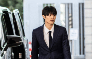 J-pop star Kenshin Kamimura fined in Hong Kong for indecent assault on interpreter On hearing the sentence, Kamimura hugged his court translator, while a handful of fans wept in the public gallery. Dozens more waited outside after the hearing ended as Kamimura left court without saying anything. The victim, identified only as X, testified in July that Kamimura and actor Junsei Motojima hired her as an interpreter to translate during a fan meeting in Hong Kong on March 1. The group then attended a celebratory dinner at a restaurant in the city’s Mong Kok district. She told the court Kamimura moved to sit beside her during a toasting session and started repeatedly brushing and patting her thigh before suggesting they visit the bathroom together. He asked both in Chinese and Japanese if she knew what he meant, she added. X said she declined, telling him, “If you want to go, you can go by yourself.” She said she then moved away to get some tea, but Kamimura blocked her path and again asked her to go outside. She told the court she refused. After X returned to her seat, Kamimura also came back and sat beside her. He apologised and said, “Forget what just happened,” she recalled in her testimony. The singer also asked her about her relationship status and whether she planned to marry her boyfriend, she said. Kamimura then brushed her inner thigh again with the back of his right hand, X told the court. She shrank away, but he repeated the action about two to three times. Kamimura’s lawyer said in mitigation that his client did not intend to coerce or threaten and that alcohol might have affected his judgment. The magistrate said that Kamimura had paid a huge price for the incident, saying he was immediately fired by his company and forced to leave the band.