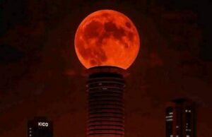 Blood moon shines in the evening sky Blood moon shines in the evening sky