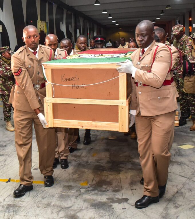 Fallen Officer’s Body Arrives Home from Haiti Fallen Officer’s Body Arrives Home from Haiti