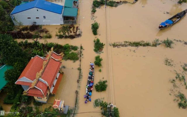Thousands stranded as record floods submerge Vietnam streets, eight people killed