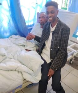 Photo: Kaluma Boy and his father