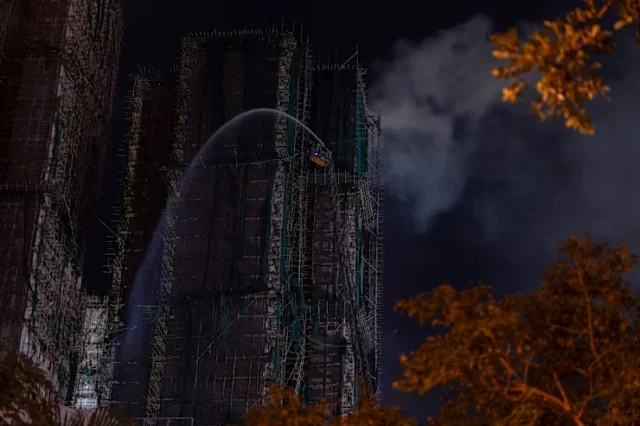 Death toll in Hong Kong high-rise fire has risen to at least 55