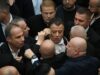 Albanian opposition and ruling party lawmakers scuffle in parliament over student protest tensions Albanian opposition and ruling party lawmakers scuffle in parliament over student protest tensions