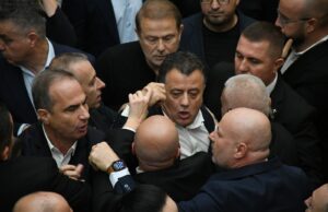 Albanian opposition and ruling party lawmakers scuffle in parliament over student protest tensions Albanian opposition and ruling party lawmakers scuffle in parliament over student protest tensions